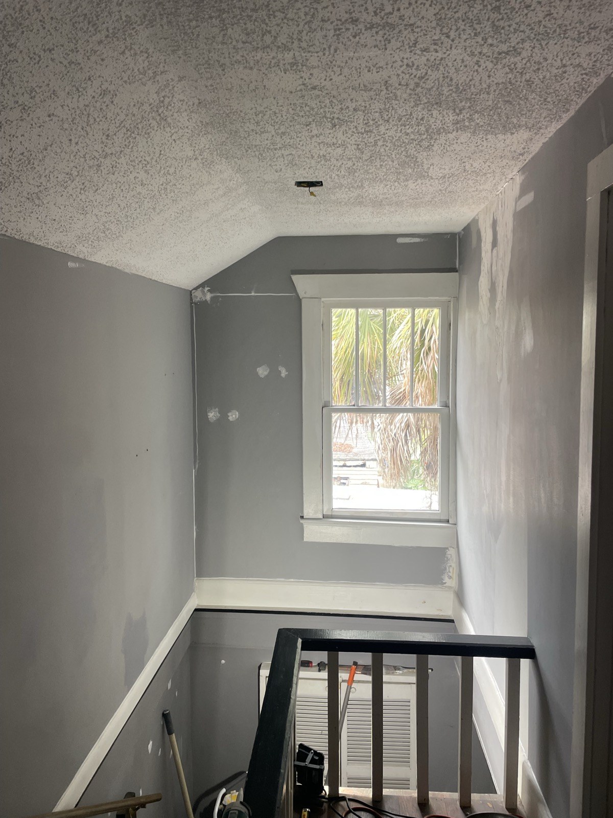Interior stairwell before repaint
