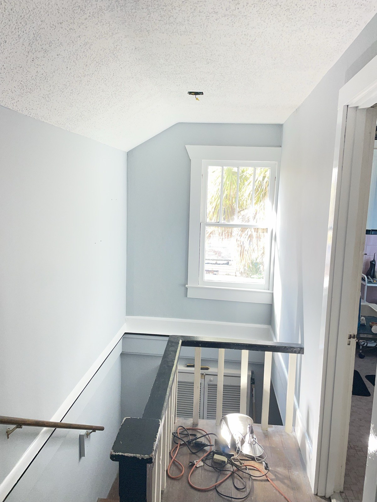 Interior stairwell freshly painted light blue