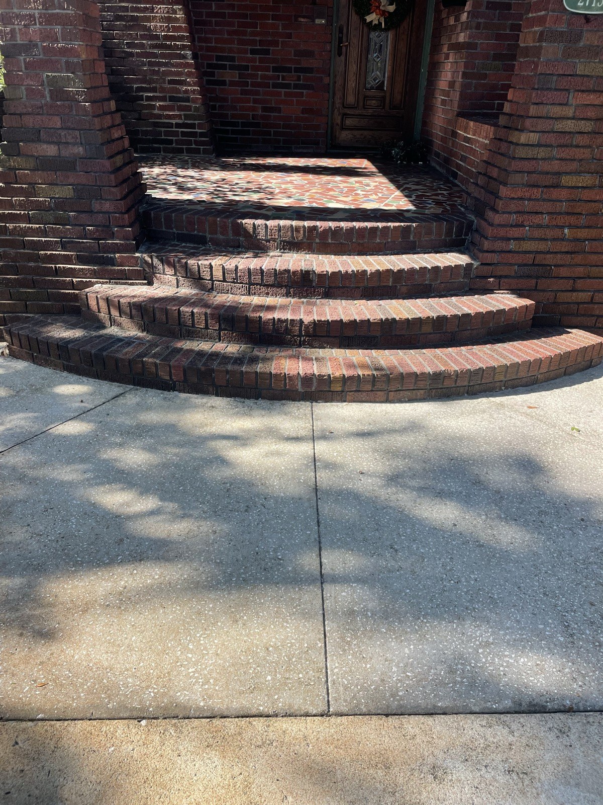 Brick steps and walkway after power washing