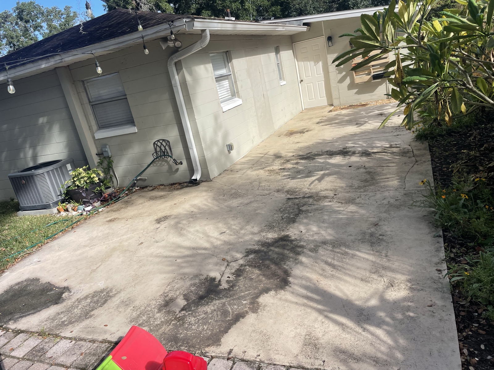 Stained concrete driveway before painting